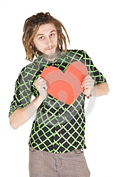 Young dreadlock man with red paper heart isolated photo