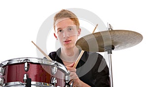 Young drummer playing music