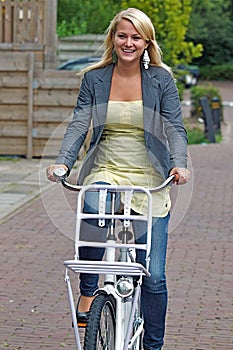 Young woman on bike photo