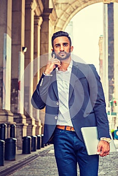 Young East Indian American Businessman traveling, working in New
