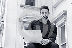 Young East Indian American Businessman with beard working in New York City