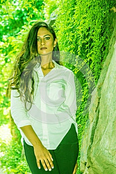 Young East Indian American Woman traveling, relaxing at Central Park, New York