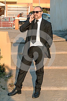 A young elegant man is on the beach. Ardea. Italy.