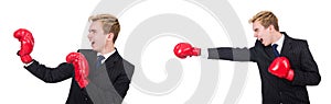 The young employee with boxing gloves isolated on white