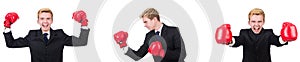 The young employee with boxing gloves isolated on white