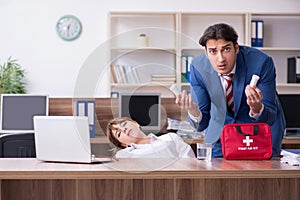 Young employee suffering in the office