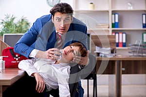 Young employee suffering in the office