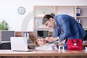 Young employee suffering in the office