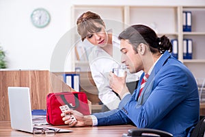 Young employee suffering in the office