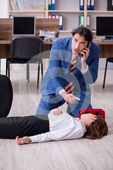 Young employee suffering in the office