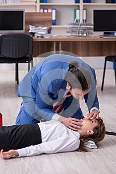 Young employee suffering in the office