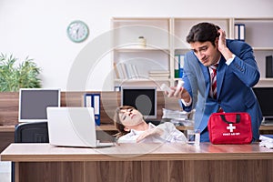 Young employee suffering in the office