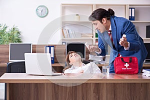 Young employee suffering in the office