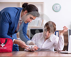 Young employee suffering in the office