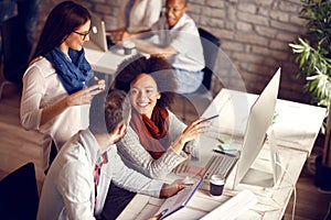 Young employees in office photo