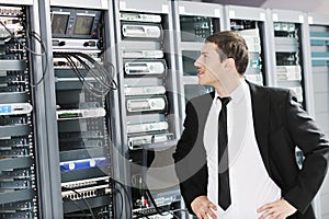 Young it engeneer in datacenter server room