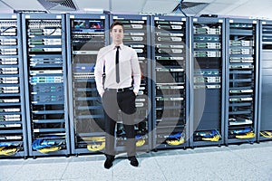 Young it engeneer in datacenter server room