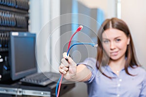 Young engineer and businesswoman with the management console