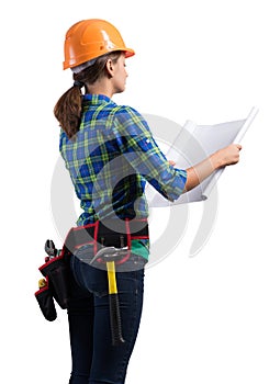 Young engineer in hard hat with blueprint