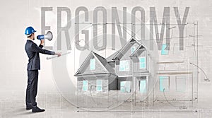 Young engineer holding blueprint