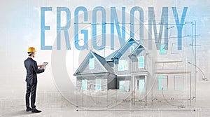 Young engineer holding blueprint