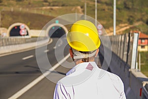 Young engineer near the tunnel