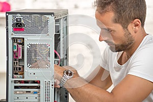 Young engineer repaired a computer