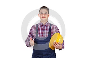 Young engineer showing thumbs up