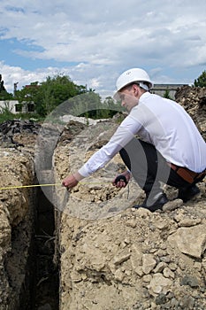 Young engineer on site