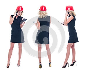 Young engineer woman with tablet calling by phone, front, side,