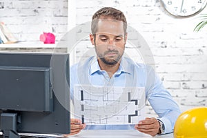 Young engineer working on his computer