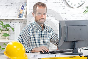 Young engineer working on his computer