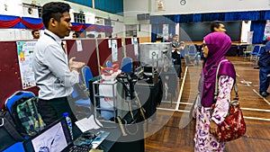 Young engineering student presenting his product at the Final Year Project exhibition event in UniKL MFI