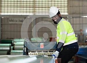 Young engineers engineers testing and confirming that the machinery at the factory