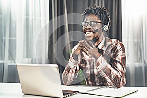 Young English Speaking Teacher is Giving Online Video Lesson. Plan of the Study Semester. Man Sits at the Table and