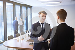 Young Entrepreneurs Talking in Conference Room