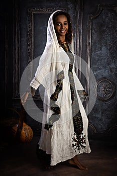 Ethiopian model with gourd basket photo