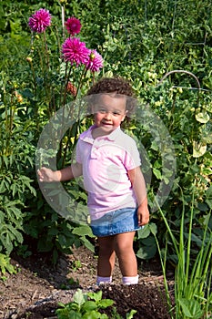 Young Ethnic Girl in Garden