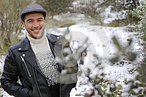 Young ethnic man enjoying the cold weather