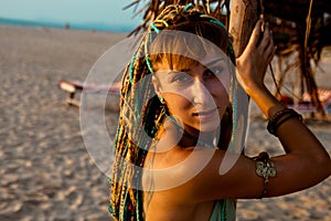 Young ethnic style girl at the beach
