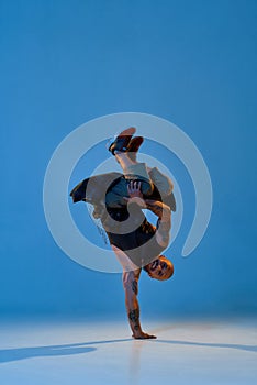 Young european male dancer dancing hip hop dance