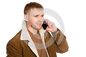Young European man talking on a smartphone