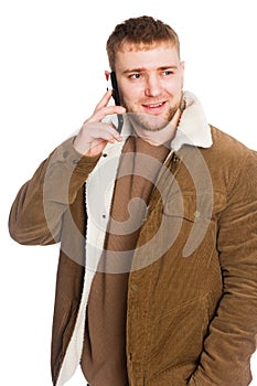 Young European man talking on a smartphone