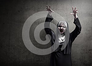 Young evil asian woman nun scare