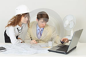 Young experts are occupied by work at office