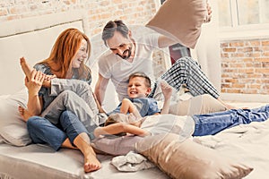 Young family being playful at home