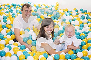 Young family in child room. Childhood memories.