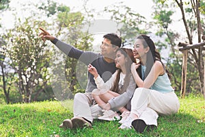 Young family with children having fun in the park