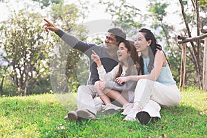 Young family with children having fun in the park