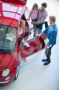 Young family chooses to buy a car